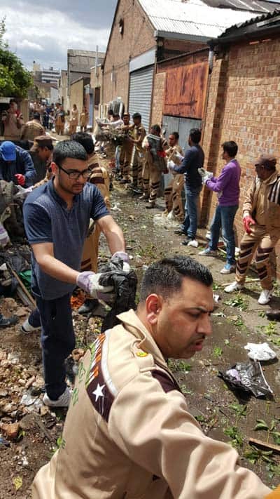 DSS Volunteers cleaning the Alleyway